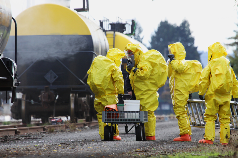 HAZMAT Team Members Suited Up For Disaster Drill